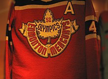 Photo of hockey jersey with a maple leaf crest