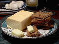 Image 8 Limburger cheese Photo credit: Jon Sullivan/Pharaoh Hound A plate of Limburger cheese and pumpernickel bread. Limburger originated from Limburg, Belgium, and is known for its strong odor, which is due in part to being fermented with the same bacteria partially responsible for human body odor. More selected pictures