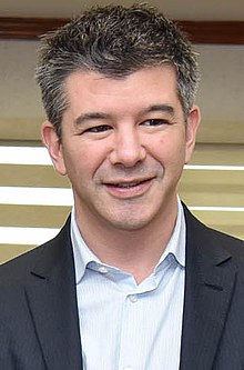 Kalanick seated onstage