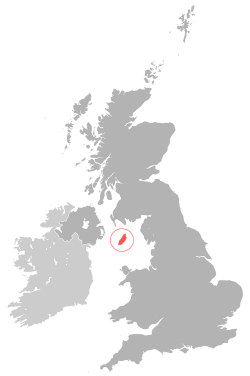 Location of  Isle of Man  (red) in the Irish Sea (Manx Sea) between England · Scotland · Wales and Northern Ireland  (dark grey)