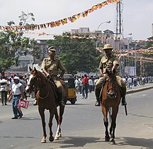 Mounted police patrolling during cricket match in MAC Stadium, Chepauk