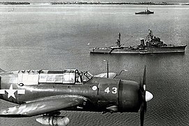 Curtiss SB2C Helldiver flies over Jaluit atoll, in October 1945 (NNAM.1996.253.538).jpg