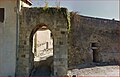 The rue des capots, and the "porte anglaise" in Mézin, Lot-et-Garonne. The rue des capots was formerly inhabited by the Capots (Cagots) of the town.