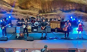 The Avett Brothers at Red Rocks Amphitheater, 2022. Left to right: Bob Crawford, Scott Avett, Mike Marsh, Seth Avett, Bonnie Avett-Rini, Joe Kwon, Tania Elisabeth