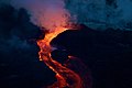 Image 9A gentle, or effusive, volcanic eruption, in which liquid material (lava) gently flows from a vent, in this case in south-eastern Hawai’i island (from Volcanism)