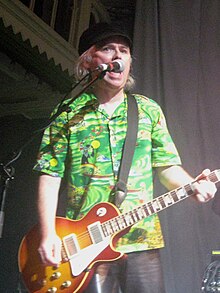 Innes performing with Primal Scream in 2011
