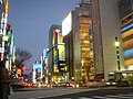 The Sony Building and intersection at dusk. The Sony building was demolished in 2017, and the new Sony building is scheduled for completion and opening in fall 2022.[needs update]