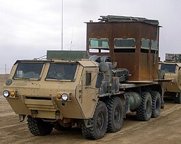 HEMTT M1120A2 with an early Simula-supplied cab armoring kit in Iraq