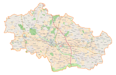 Mapa konturowa powiatu kutnowskiego, w centrum znajduje się punkt z opisem „Parafia św. Wawrzyńca”