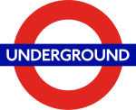 London Underground roundel, a logo made of a red circle with a horizontal blue bar.