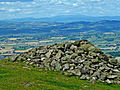 Cairn at summit of Corndon Hill looking over Montgomeryshire towards the Berwyns