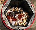 A 6.8 kg (15 lb) barrel full of tumble-polished agate and jasper