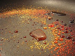 Sugar caramelizing on a hot pan