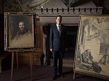 George Friedrich Prinz von Preussen standing in Hohenzollern Castle.