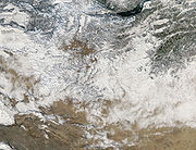 Imaxe satélite con Mongolia cuberta de neve.