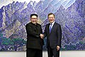 Image 8North Korean leader Kim Jong Un and South Korean President Moon Jae-in shaking hands inside the Peace House on 27 April 2018 (from History of South Korea)