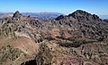 Looking north from the summit to line parent Peak 9860 on left, and Raymond Peak on the right.