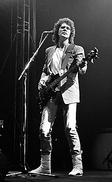 Illsley playing with Dire Straits on their Brothers In Arms Tour, on 10 May 1985, Belgrade