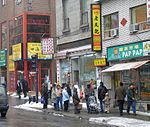 A bus stop located along Saint-Laurent Boulevard in Chinatown.