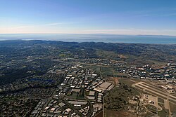 Aerial view showing portion of Lake Forest to the left