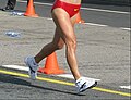 Image 13A racewalker "flying" (entirely out of contact with the ground, a rule violation) (from Racewalking)