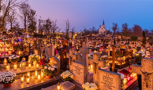 All Saints' Day at a cemetery in Poland by Diego Delso