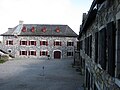 Store room and powder magazine (now Mars Education Center); soldiers' barracks at right