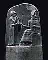 Image 9King Hammurabi receiving the code of laws from the Mesopotamian sun god Shamash