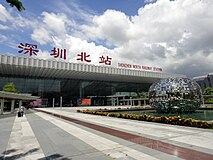 Looking at Shenzhen North railway station from the vast west square. Long distance coach stations are located to the left and right of this picture.