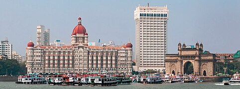 A view of the hotel with the Gateway of India, as seen from the Arabian Sea