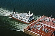 Towboat Ben McCool upbound on Ohio River at Matthew E. Welsh Bridge with two tank barges (3 of 6), near Mauckport, Indiana, USA, 1987