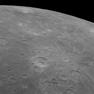 Oblique view of Carducci crater (below center) and Copley crater with bright rays