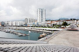 The urbanized coastal limit of Ponta Delgada at São Sebastião, including the commercial mall and business quarter, as seen from the Portas do Mar