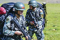 Two soldier holding assault rifles