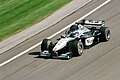 From 1997 to July 2005, McLaren switched to West. This is Mika Häkkinen driving the McLaren MP4-15 at the 2000 United States Grand Prix.