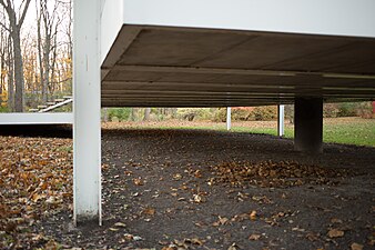 Underside of house. Note the tube in the center of the house designed as a single point of entry for all the building's utilities.