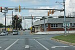 Maryland Route 231 (Prince Frederick Road) at the intersection with Maryland Route 5 Business in the heart of downtown Hughesville