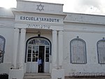 School of Moisés Ville with Spanish and Hebrew inscription
