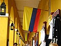 Colombian tricolor in a colonial building corridor in Cartagena de Indias.