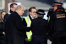 Examples of black and white as well as red and white chequers on the hats of police officers in London