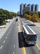 Number 65 bus leaving a Metrobús station