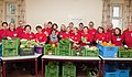 Volunteers of Caritas Vienna with fresh food produce.