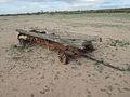 The remains of a farm wagon in an abandoned field near Quail Creek