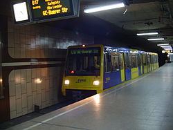 A P89 train in yellow livery on the U17 at Universität Essen