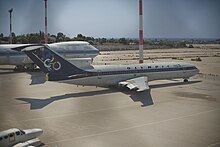 Olympic (former) 727 with 747 in the background