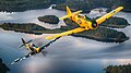 Finnish Air Force Hawker Hurricane warbird with US Navy T-6 Texan warbird in Finland