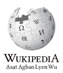 Wikipedia logo showing "Wikipedia: The Free Encyclopedia" in Tyap