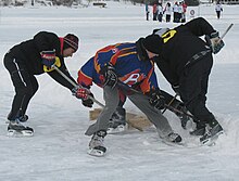 Photo de joueurs amateurs en extérieur.