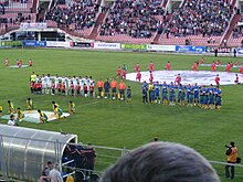 Dinamo Tbilisi and Olimpi Rustavi lining up on the pitch before the start of the 2008-09 Georgian Cup Final.