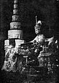 King Prajadhipok of Thailand signs a constitution within the Ananta Samakhom Hall. A large white chatra is seen nearby his throne.